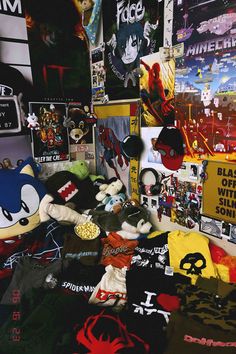 there are many t - shirts on display in this room, including one for the boys