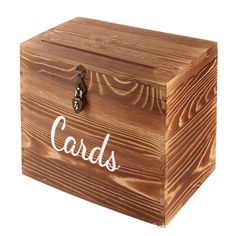 a wooden box with the word cards written on it