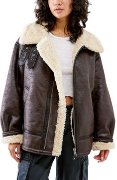 Modeled after vintage aviator styles, this crackled faux-leather jacket is lined with plush faux shearling to keep you cozy in cool weather. 26" length (size Medium) Spread collar 51% viscose, 49% polyester with polyurethane coating; 100% polyester faux shearling Dry clean Imported Aviator Leather Jacket, Timeless Fashion Pieces, Jacket Outfit Women, Urban Outfitters Jacket, Aviator Jacket, Fur Leather Jacket, Trendy Jackets, Bdg Urban Outfitters, Aviator Jackets