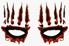 an artistic mask with red and black paint on it