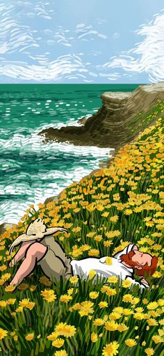 a man laying on top of a field of yellow flowers next to the ocean