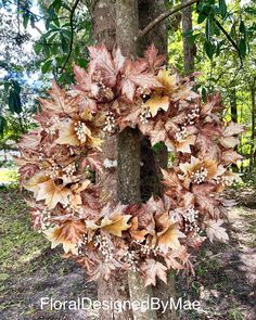 a wreath is hanging on the side of a tree