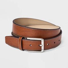 Whether you’re working in the office or lunching with friends, this Dress Belt from Goodfellow & Co™ adds the perfect finishing touch to your look. This dress belt is made from bonded leather for a comfortable and classic look. It also has a shiny silver buckle closure to complete the classy look and allows you to get a customized fit with multiple holes and loop. Pair with any of your pants to feel great all day. Goodfellow & Co™: Where style & fit are always in good company. Classic Fitted Belts For Fall, Brown Belts For Spring Workwear, Classic Formal Belts For Spring, Classic Spring Formal Belt, Casual Belts For Workwear In Spring, Casual Brown Belt For Workwear, Casual Belts For Spring Workwear, Casual Spring Belts For Workwear, Casual Brown Belt For Work