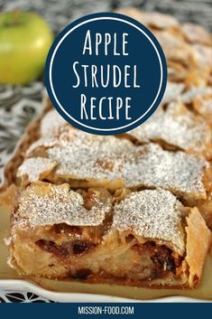 an apple strudel with powdered sugar on top and the words, german apple strudel afelstrudel