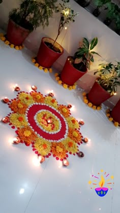 Flower rangoli for diwali Kolam With Flower Decoration, Diwali Flower Rangoli At Home, Rangoli Designs For Mandir, Flower Rangoli Designs Simple Diwali, Simple Decoration For Diwali At Home, Rangoli Idea With Flower, Diwali Decorations Flower Rangoli, Diwali Decor Outside House, Flower Rangoli Diwali Decoration