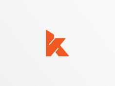 the letter k is made up of an orange arrow