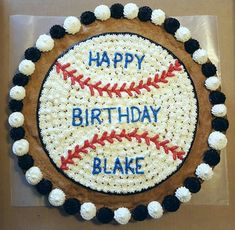 a baseball themed birthday cake with happy birthday written on it