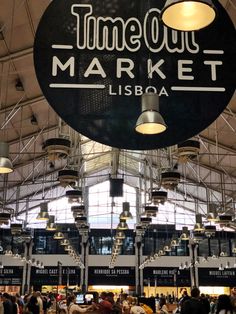 the inside of a market with lots of people