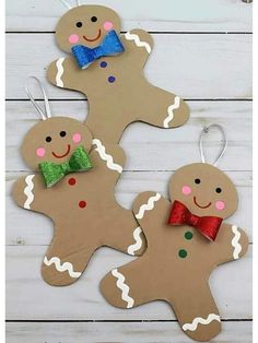 three christmas ornaments made to look like gingers with bow ties and bows on them