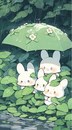 some cute little bunnies in the water under an umbrella