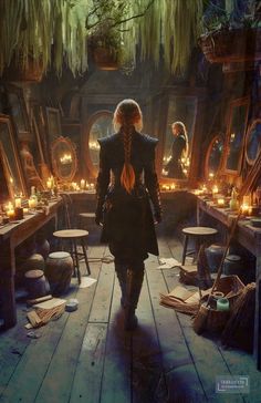 a woman with long hair walking through a room full of mirrors and candles in front of her