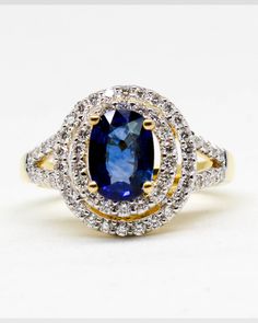 THE CEYLON BLUE SAPPHIRE 1 PEC. – 1 . 29 CARATS. WITH THE DIAMONDS 60 PECS. – 0 . 61 CARAT. 18 K.- 750 YELLOW GOLD RING 5 . 40 GRAMS. WIDTH 1 . 40 X LENGTH 2 . 00 CM. ANY SIZE IS AVAILABLE PLEASE CONTACT FOR MORE INFORMATION Ceylon Blue Sapphire, Yellow Gold Ring, Yellow Gold Rings, Blue Sapphire, Sapphire Ring