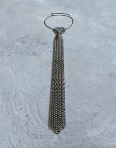 Hello! I made this NeckTie using strong & skin-friendly, Stainless Steel rings, with the ancient craft of chainmail. * This handmade accessory will look cool & unique on your neck. (Be ready for curious questions ;) * It would be a perfect gift for a loved one, friend or a stylish family member 🎁 - The technique used here is European 6 in 1 chainmail pattern where all the rings were attached to each other one by one by hand. - It is a limited number production and a unique design.  - Neck chain is adjustable for every size. HOW TO TAKE CARE OF YOUR ACCESSORY? Stainless steel is great for jewelry because it's so durable, but you still need to care for it in order to keep it looking good and lasting longer. * Clean regularly with mild soap and warm water. * Rinse thoroughly to remove any so Neck Jewelry Queer, Triangle Chain Mail, Chainmail Ring Patterns, Luxury Chainmail Metal Jewelry, How To Chainmail, Chainmail Tie, Chainmail Bra, Chainmail Clothing, European Pattern