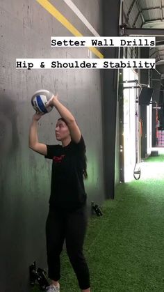 a woman holding a ball up against a wall with the words setter wall drills hip & shoulder stability