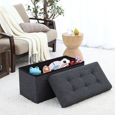 an orange ottoman sitting on top of a white rug