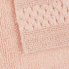 a close up view of a pink blanket