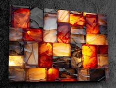 an abstract piece of art made out of glass blocks