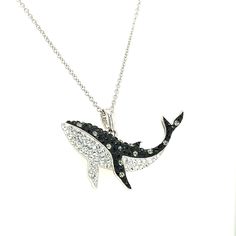 This playful necklace features a sterling silver Orca whale pendant that has been decorated with black and white Swarovski crystals to create a dazzling contrast. The pendant suspends from a strong sterling silver cable chain that adjusts in length from 18 to 20 inches. Sterling Silver Swarovski Crystals: Black and White Polished Finish Adjustable Cable Chain: 18-20 inches Spring Ring Clasp Orca Jewelry, Black And White Crystals, Whale Pendant, Crystals Black, Whale Necklace, Orca Whale, Red Tourmaline, Blue Star Sapphire, Spessartite Garnet