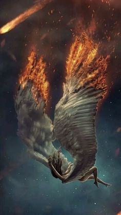 a large bird flying through the air with fire coming out of it's wings