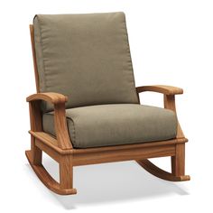 a wooden rocking chair with a cushion on it's back and seat padding