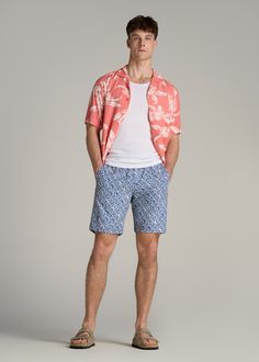 Make a Splash: Essential Swim Trunks for Tall Guys Dive Into Comfort & Style Ready to dive into summer? Our Volley Swim Shorts are here to ensure you do it in style. Crafted from quick-drying woven fabric, these tall men's swim trunks are designed for the guy who's ready to comfortably go from pool to party, featuring a stretch waistband with an external drawstring for a perfect, secure fit. Whether you're hitting the waves or lounging poolside, the above-knee length offers the ideal balance of Bermuda Cotton Swim Trunks For Vacation, Casual Bermuda Swim Trunks For Summer, Blue Tropical Shorts For Summer, Summer Bermuda Cotton Swim Trunks, Cotton Bermuda Swim Trunks For Summer, Tropical Blue Bottoms For Summer, Casual Summer Swim Trunks, Tropical Cotton Shorts For Beach, Cotton Bermuda Bottoms For Beach Season