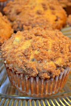 some muffins are sitting on a cooling rack