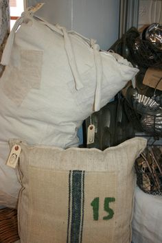 pillows and other items are piled on top of each other