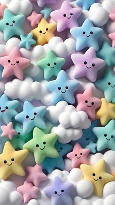 many different colored stars are in the shape of clouds with smiles on their faces and eyes