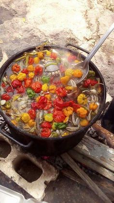 a pan filled with food sitting on top of a stove