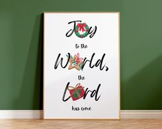 a poster with the words joy to the world, the lord has come on it