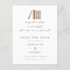 save the date card with books on it