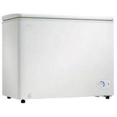 a white chest freezer sitting on top of a table