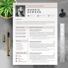 a professional resume template with a pencil, ruler and pen on the table next to it