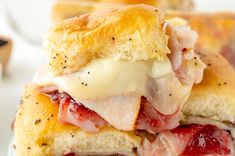 These Cranberry Turkey Sliders channel all of the fall vibes with warm bread, melty cheese, and bright cranberry sauce!