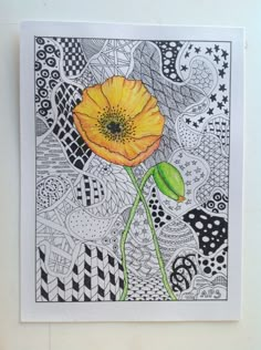 an orange flower is in the middle of a drawing