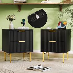 two black and gold nightstands in front of a green wall with a clock on it