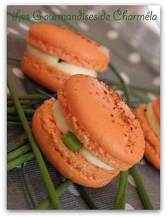 small sandwiches with cheese and green onions on a tableclothed cloth, ready to be eaten