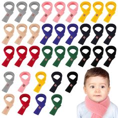 the baby is wearing a scarf and it has many different colored clips in each row