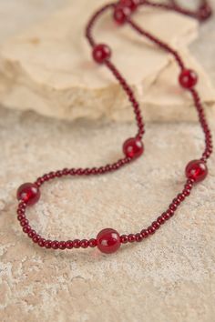 The new Chianna Necklace is a fashionable update to one of Blue Illusion’s most beloved styles. Featuring a thin beaded chain and larger bead accents, this long Pinot-coloured necklace is the perfect jewel-toned piece for winter. Colourful Necklace, Beaded Chain, Ruby, Beads, Chain, Blue