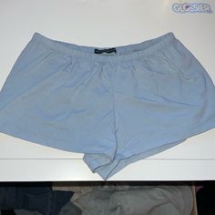 Never Worn Before Blue Stretch Summer Shorts, Blue Cotton Athletic Shorts For Summer, Light Blue Summer Athletic Shorts, Blue Summer Pajama Shorts, Light Blue Athletic Shorts For Summer, Casual Blue Pajama Shorts With Elastic Waistband, Blue Summer Pajama Shorts With Short Inseam, Blue Cotton Jean Shorts For Day Out, Blue Relaxed Fit Shorts For Loungewear