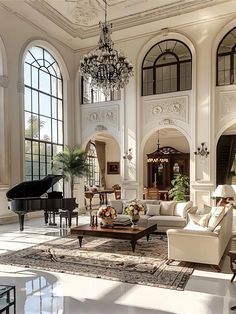 an elegant living room with grand piano and chandelier