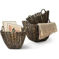 two woven baskets sitting next to each other