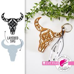 the laser cut keychain is designed to look like an animal's head