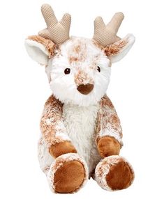 a stuffed animal with antlers on it's head and legs, sitting in front of a white background