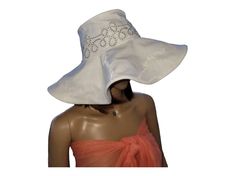 "Beautiful, sophisticated white cotton canvas wide brim floppy hat. white organza overlayer for that special occasion touch. Embellished with beautiful white lace adorned with simulated rhinestones. Inner top and Crown is lined with soft satin/charmeuse fabric to caress your hair. Brim inner edge is reinforced with horsehair braid trim to maintain  structure.  Hat brim height can be costumized from 4\" , 5\" or 6\" as desired.  Sample displays 5\" brim.  Lace is x crossed at center back running down to brim outer edge adding that special touch of elegance.  Hat can be dry clean, or spot clean if necessary.  Handmade with love&care for you by TudiiTavFromNJ Shop policy: No refunds or exchanges  My products are one of a kind. Each custom product is designed to meet the client's size, color, Chic Cloche Sun Hat For Summer, Chic Summer Cloche Sun Hat, White Elegant Hat For Vacation, White Fitted Summer Hat, Elegant White Hat For Vacation, Elegant White Vacation Hat, Chic Brimmed Sun Hat For Church, Elegant Cloche Sun Hat For Beach, White Fitted Sun Hat For Vacation