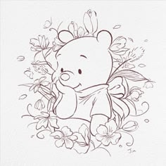 a drawing of a teddy bear surrounded by flowers