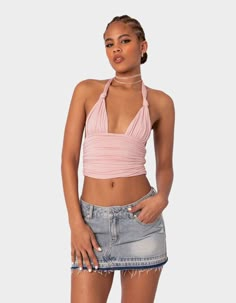 This Knotted Halter Top Is Perfect For When You're Looking To Add A Little Twist To Your Outfits. Whether You Choose To Wear It With Your Favorite Jeans Or A Cute Mini Skirt, It Will Become Your Go-To Top For Your Next Event. Halter Top. Neck Tie Closure. Knotted Detailing. Gathered Fabric. 95% Polyester, 5% Spandex. Model Wears Size S. Model Height Is 5'11. Item Care: Wash With Similar Color. | Edikted Lillie Knotted Halter Top Cute Mini Skirt, Gathered Fabric, Wishlist 2024, Flannel Sweatshirt, Graphic Trends, Summer Spring Outfits, Party Fits, Open Knit Sweater, Cargo Skirt