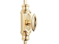 a gold door handle with an ornate design on the front and back of it,