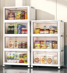 three white shelving units filled with food