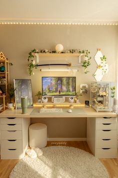 a home office with white furniture and plants on the wall above it, along with a rug